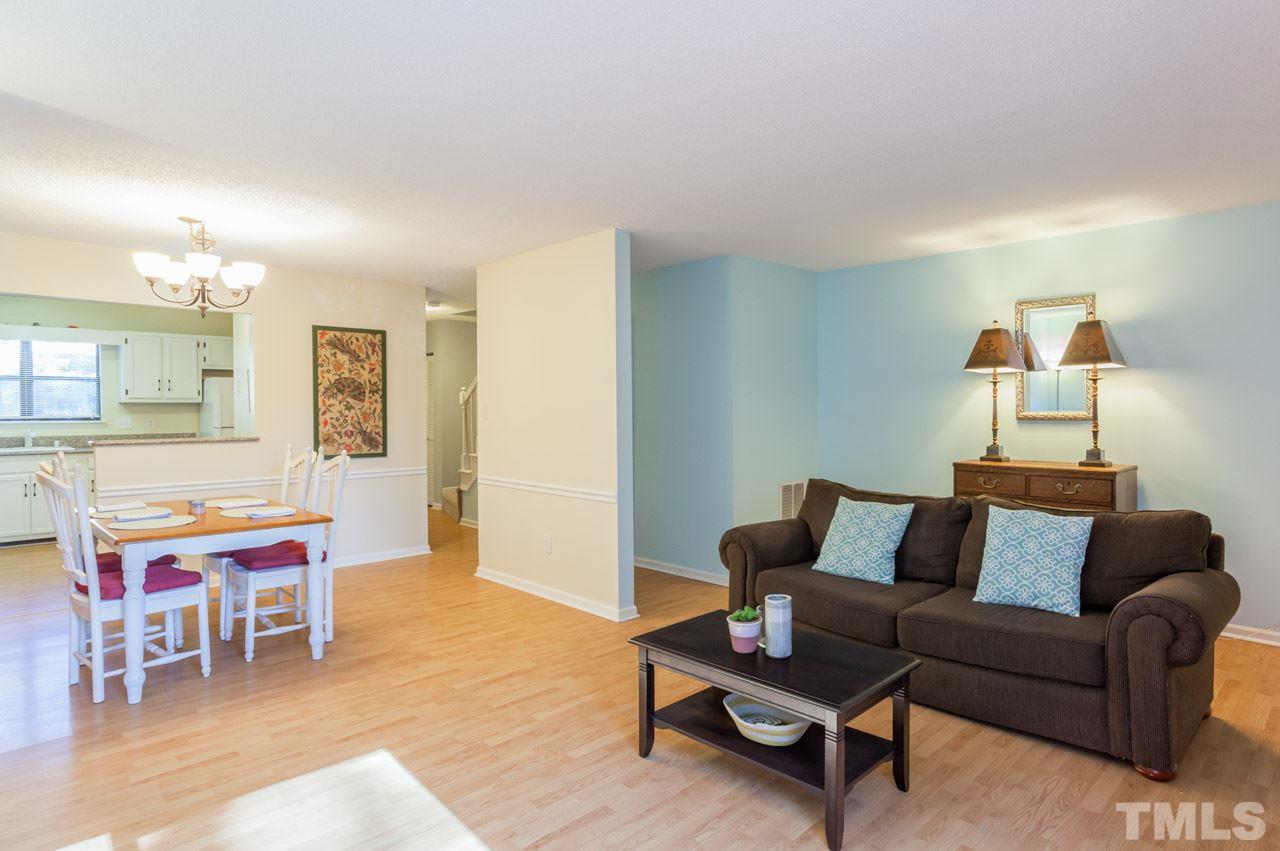 5754 Pool Side Drive Raleigh, NC 27612 - Photo 11 of 23 a living room with furniture and a wooden floor
