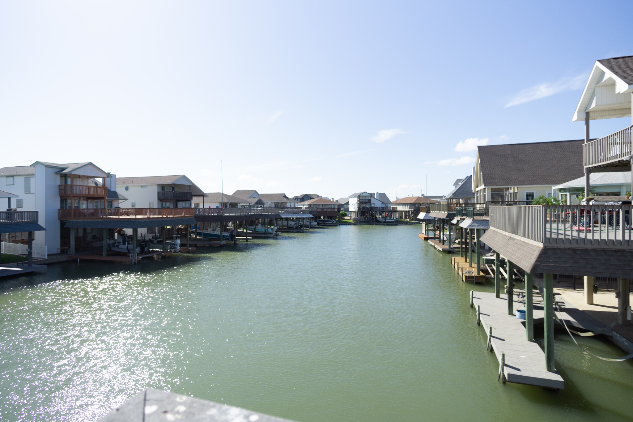 301 Commander Drive Tiki Island, TX 77554 - Photo 22 of 35 a view of a lake with houses