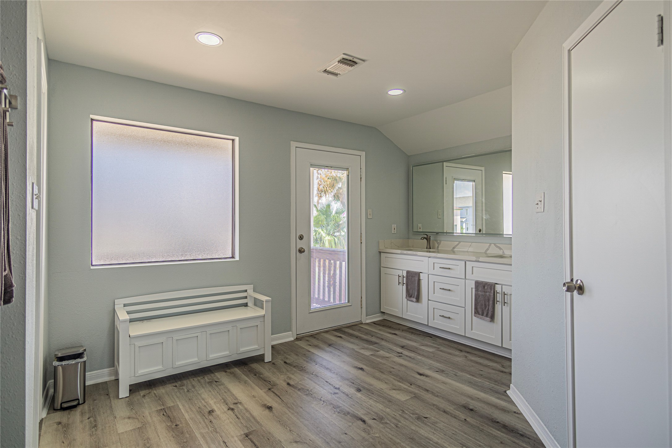 301 Commander Drive Tiki Island, TX 77554 - Photo 28 of 35 a bathroom with a sink a toilet and a mirror