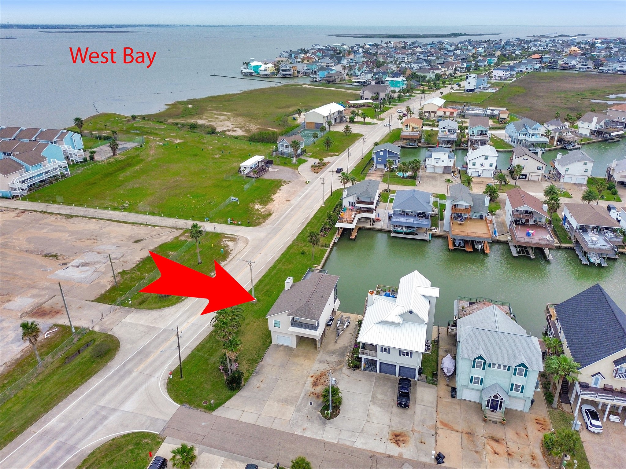 301 Commander Drive Tiki Island, TX 77554 - Photo 32 of 35 an aerial view of residential houses with outdoor space