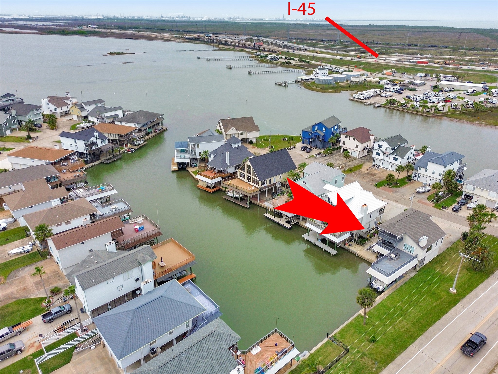 301 Commander Drive Tiki Island, TX 77554 - Photo 34 of 35 a view of a lake and a mountain view