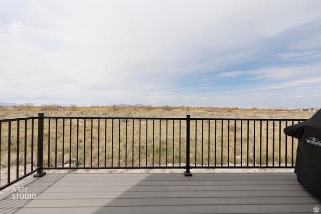 540 Lefty Lane Tooele, UT 84074 - Photo 30 of 48 Wooden terrace featuring a grill