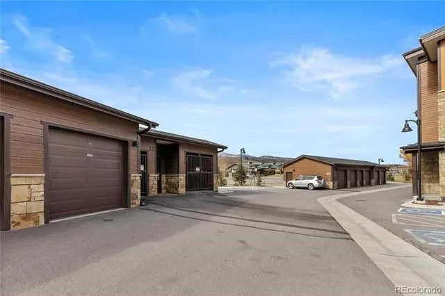 an aerial view of a house with lake view
