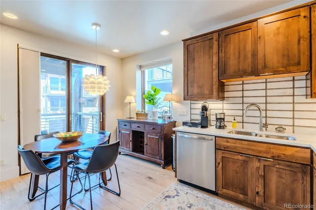 a black and white photo of a bench