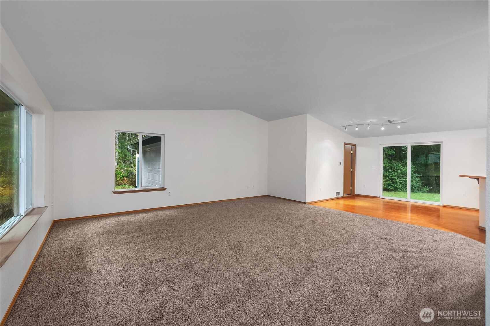 2261 East Phillips Lake Loop Road Shelton, WA 98584 - Photo 16 of 37 an empty room with windows