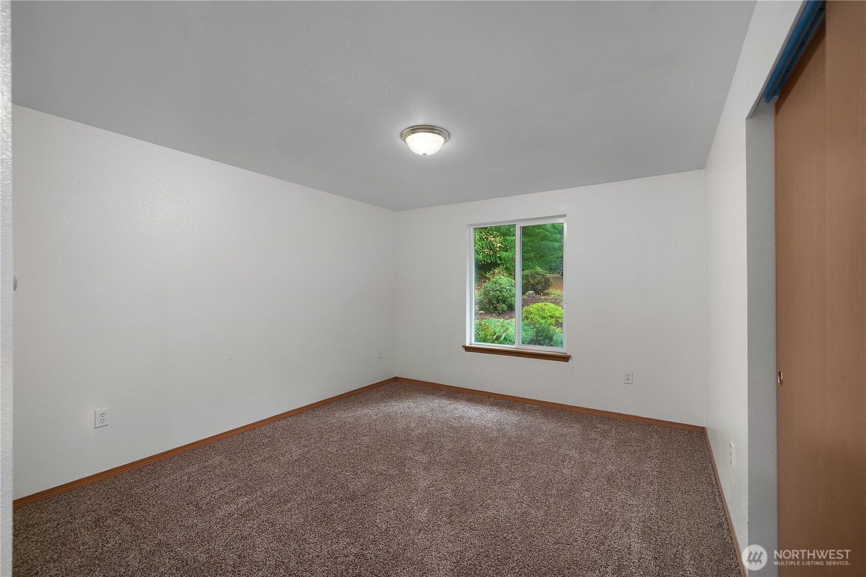 2261 East Phillips Lake Loop Road Shelton, WA 98584 - Photo 21 of 37 an empty room with windows