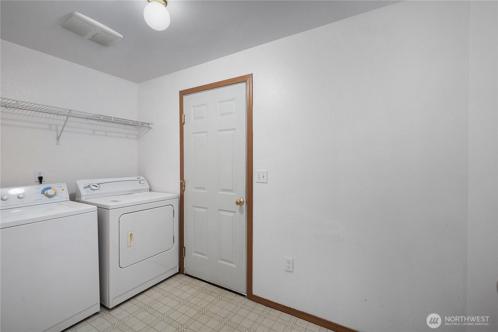 2261 East Phillips Lake Loop Road Shelton, WA 98584 - Photo 26 of 37 a view of a storage & utility room with dryer and washer