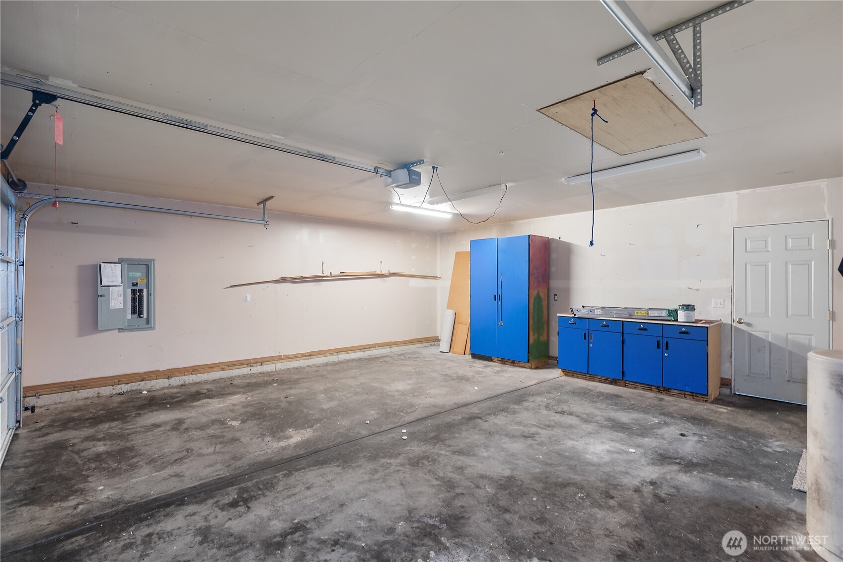 2261 East Phillips Lake Loop Road Shelton, WA 98584 - Photo 27 of 37 a view of a kitchen with a refrigerator and a window