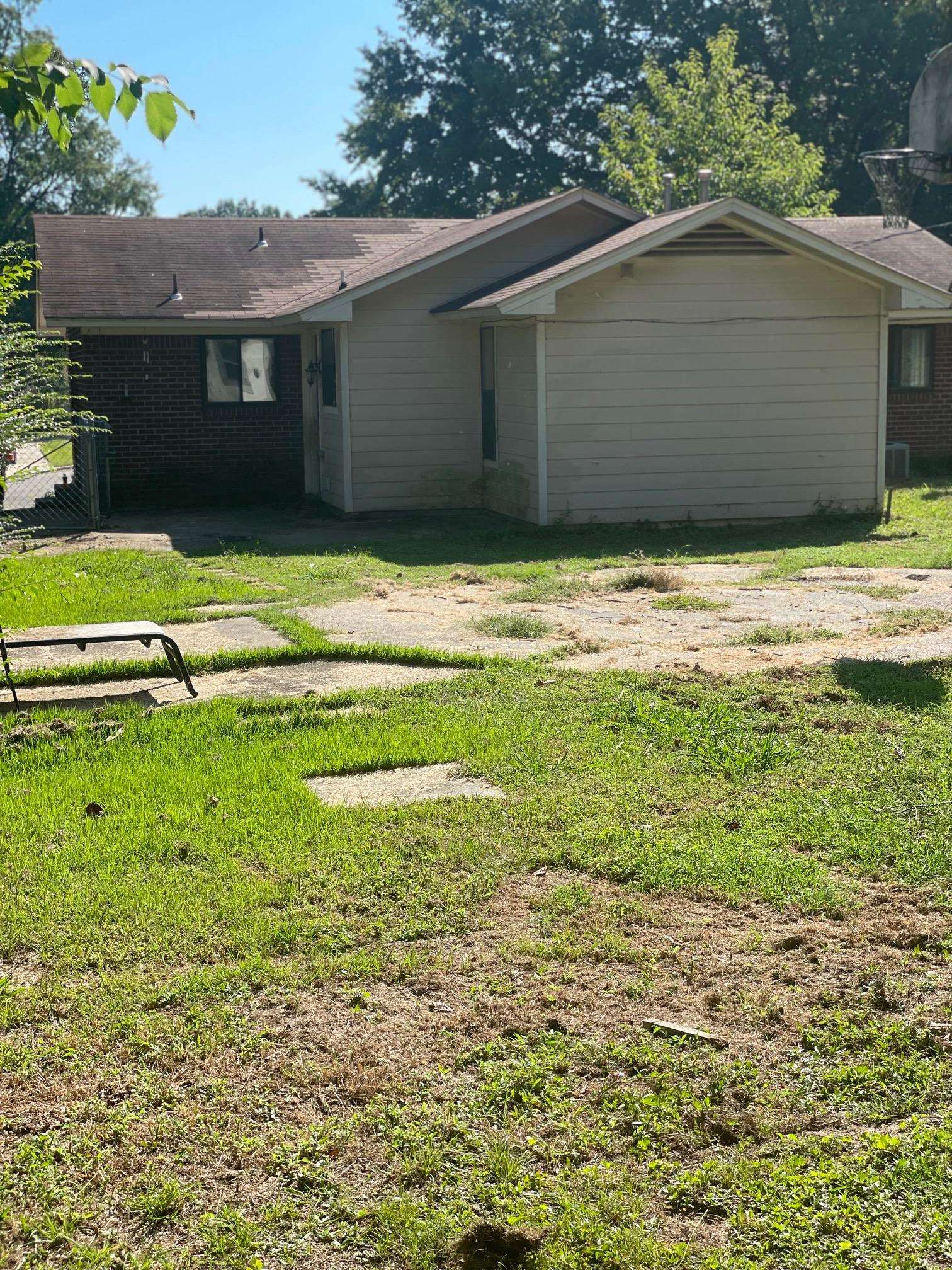 253 Montelo Road Memphis, TN 38120 - Photo 13 of 13 a view of a house with a yard