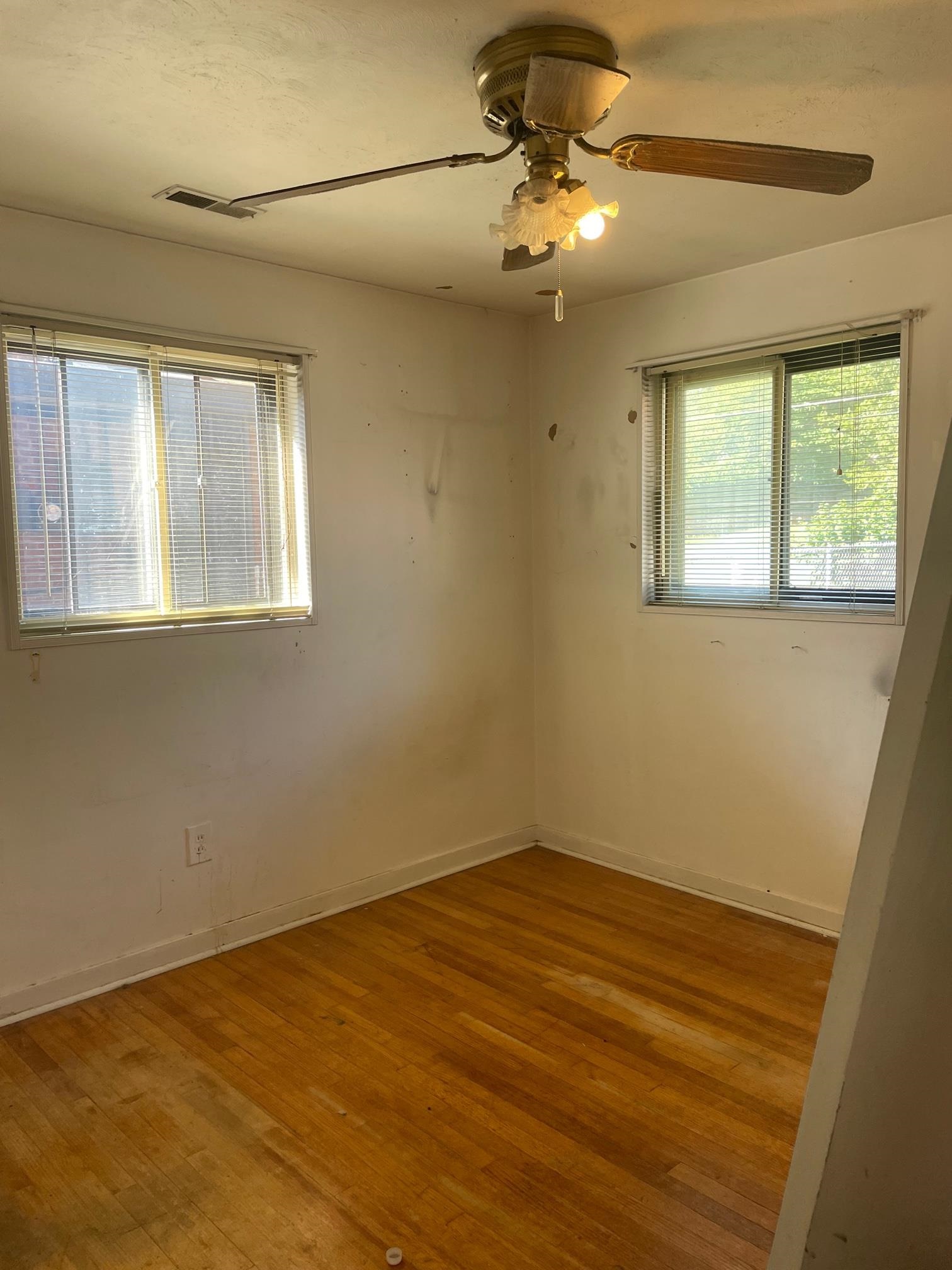 253 Montelo Road Memphis, TN 38120 - Photo 9 of 13 a view of an empty room with a window