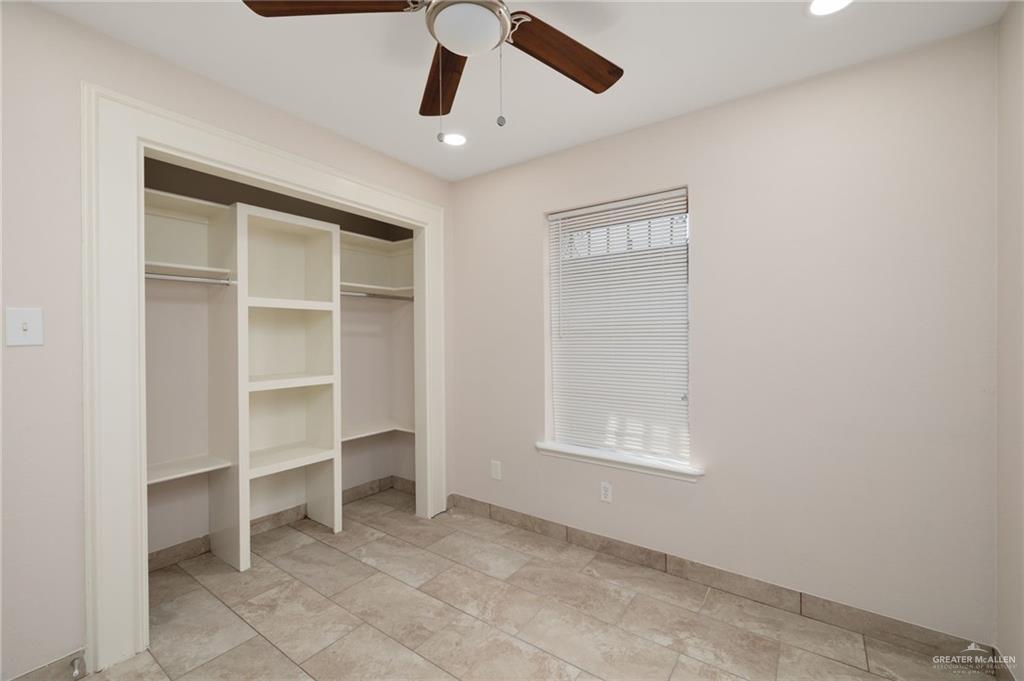 1913 South 35th Street McAllen, TX 78503 - Photo 7 of 12 a view of an empty room with a window