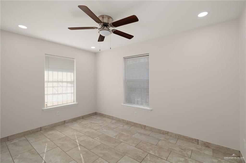 1913 South 35th Street McAllen, TX 78503 - Photo 10 of 12 an empty room with windows and closet