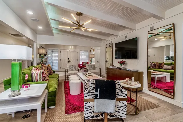 a kitchen with a sink cabinets and wooden floor