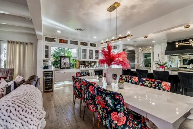 a kitchen with stainless steel appliances granite countertop a stove and a sink