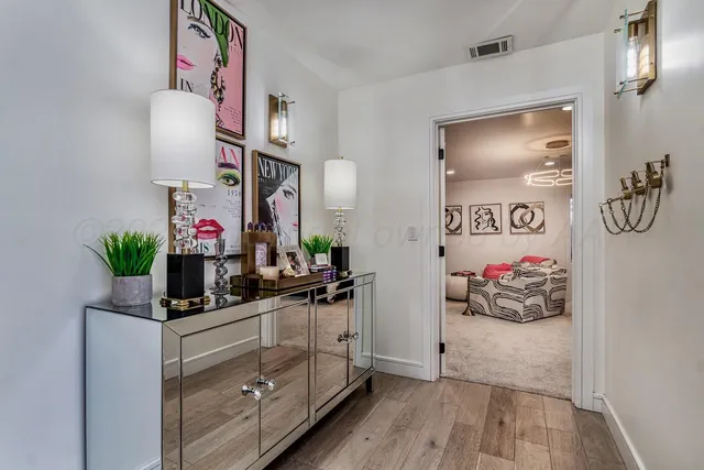 a bedroom with bed and a window