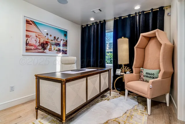 a view of a entryway door with wooden floor