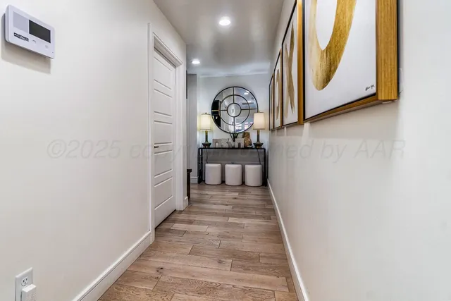 a view of a patio with a dining table and chairs