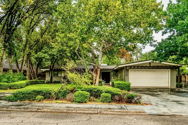 a front view of a house with a porch