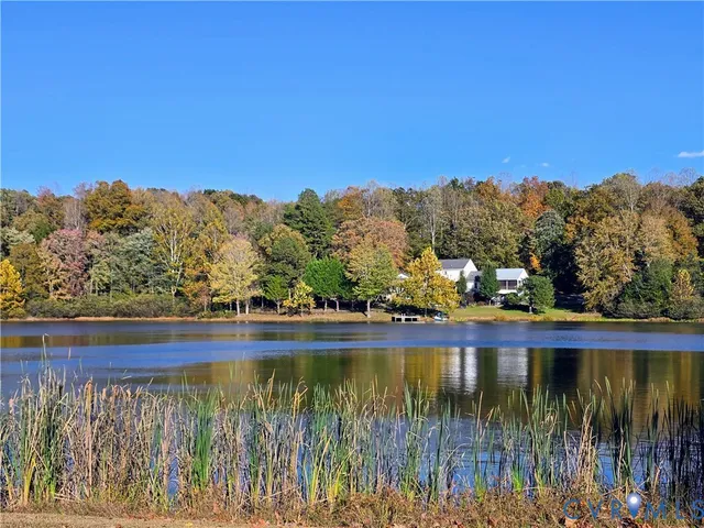 a view of a lake with a mountain in the background