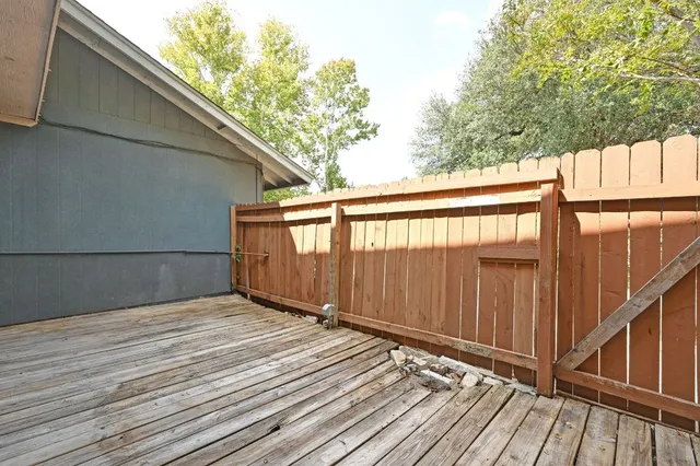 a view of a two chairs in the balcony