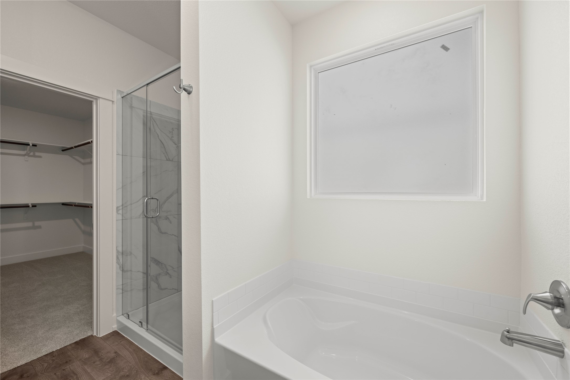 564 Gus Loop Georgetown, TX 78626 - Photo 16 of 32 a bathroom with a bathtub