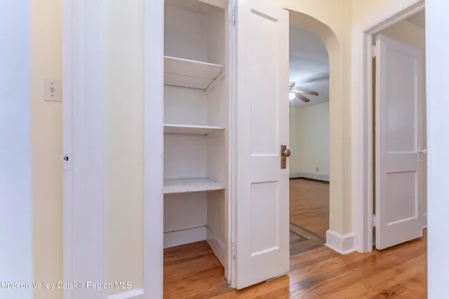 a bathroom with a toilet and a bath tub