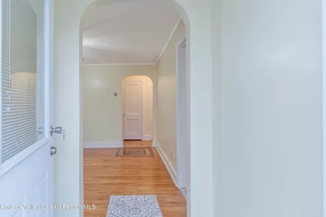 a view of a bathroom from the hallway