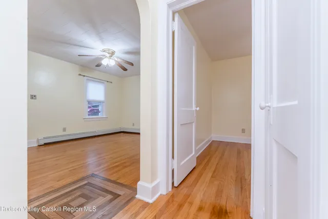 a view of a bathroom from the hallway