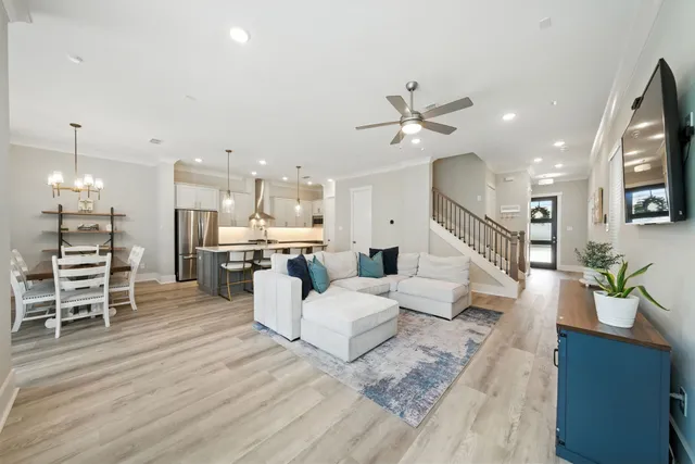 a view of a hallway with a potted plant on a wall