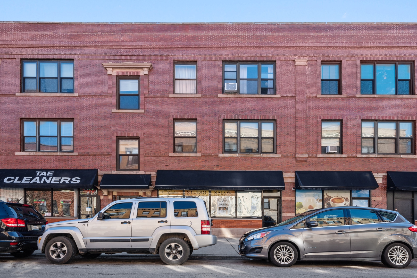 a car parked in front of a building