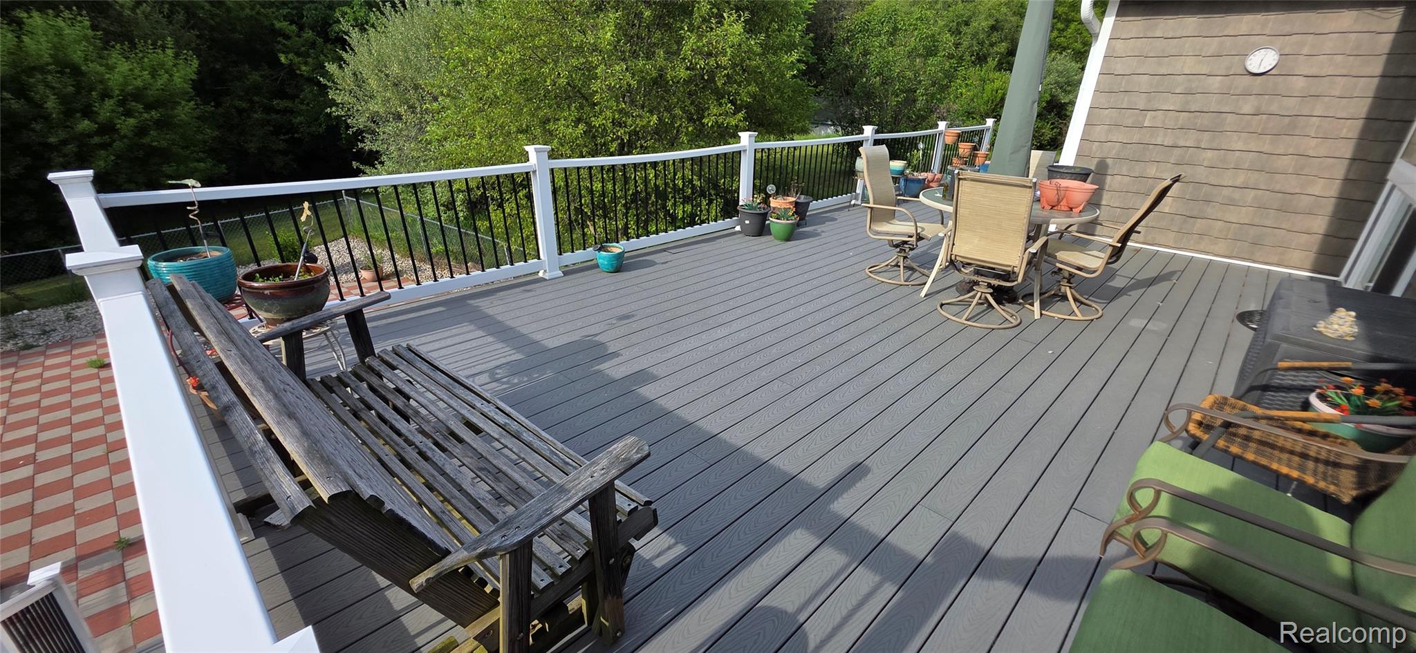 14062 Sanford Road Addison, MI 49220 - Photo 16 of 61 Spacious outdoor deck featuring composite decking and white railings with black balusters