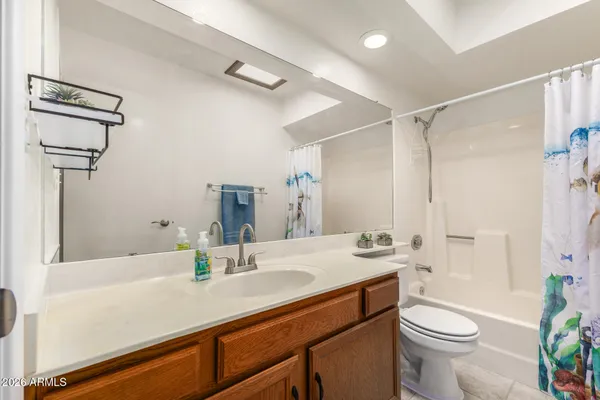 a view of a hallway with washer and dryer