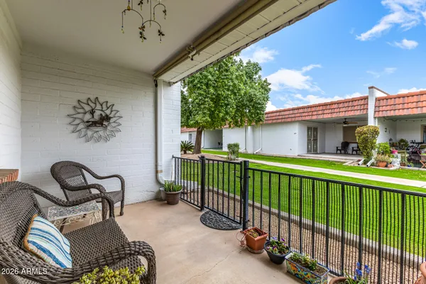 a view of chair and balcony