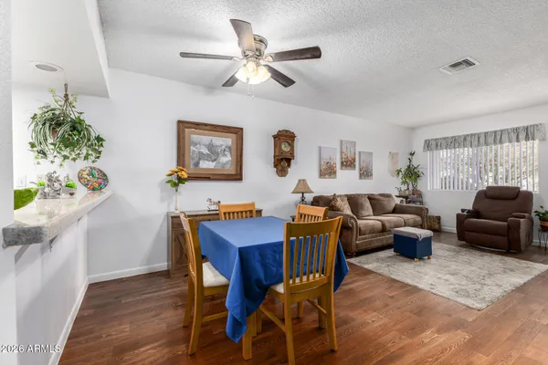 a kitchen with stainless steel appliances a stove a sink and a refrigerator