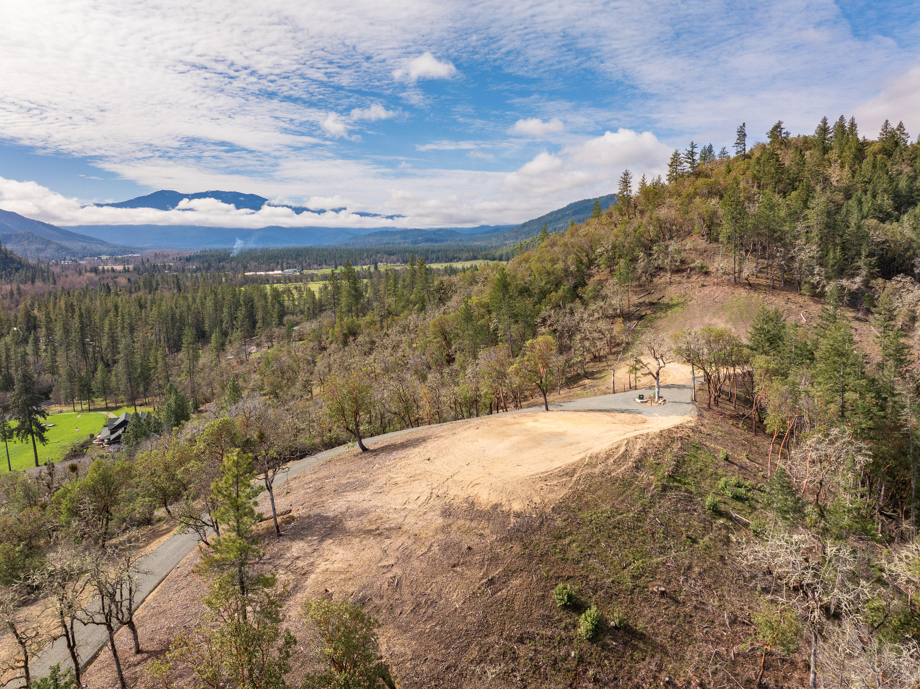 Messinger Road, Unit 700 Williams, OR 97544 - Photo 2 of 14 a view of a yard with a tree