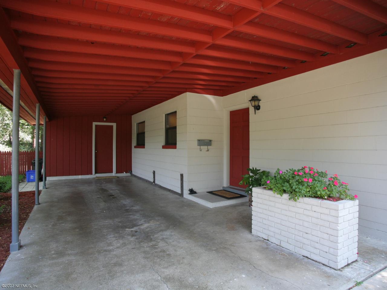 7063 Diamond Head Road Jacksonville, FL 32216 - Photo 14 of 14 Carport w/ Utility Room