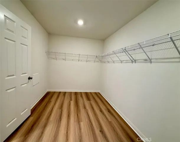 a view of a room with racks on the wall