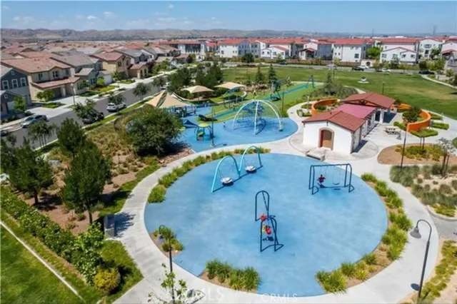 an aerial view of a house with a garden