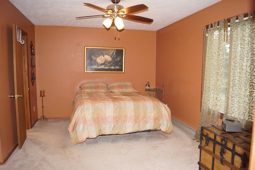 152 Reiber Road Renfrew, PA 16053 - Photo 15 of 25 This nice size master bedroom will sure to be relaxing.