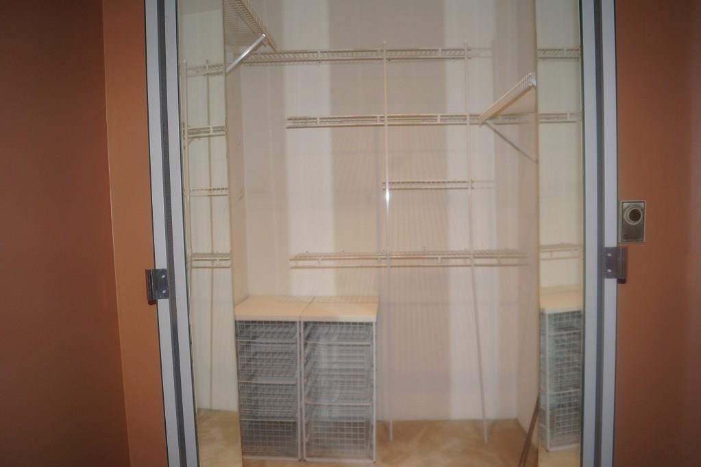 152 Reiber Road Renfrew, PA 16053 - Photo 17 of 25 One of the master bedroom closets with a built in closet system.