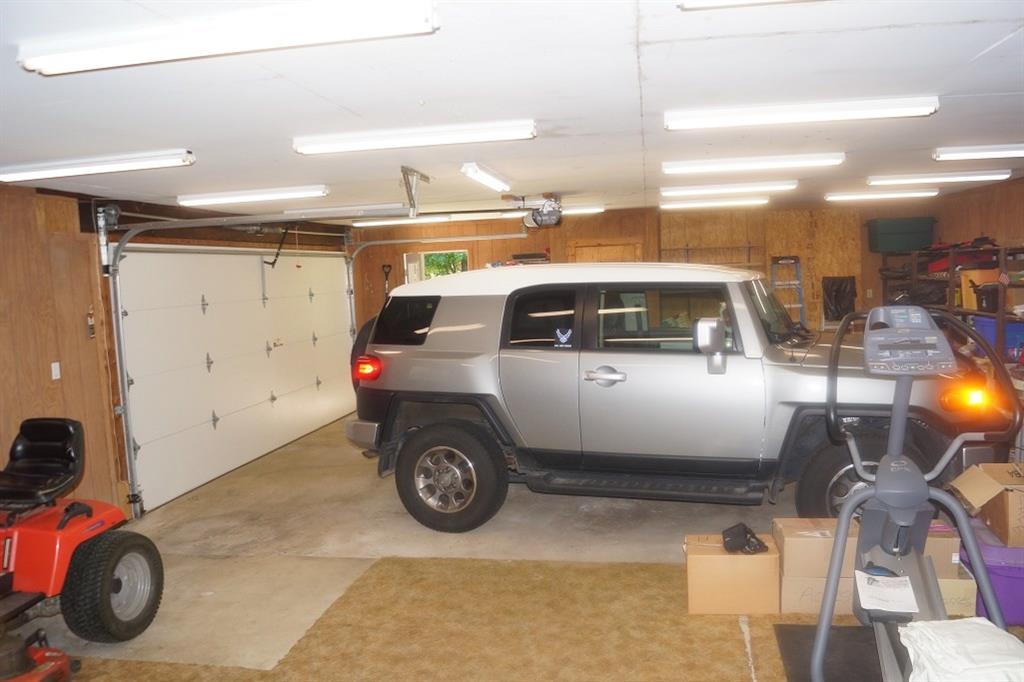 152 Reiber Road Renfrew, PA 16053 - Photo 19 of 25 Over-sized garage with tractor included.