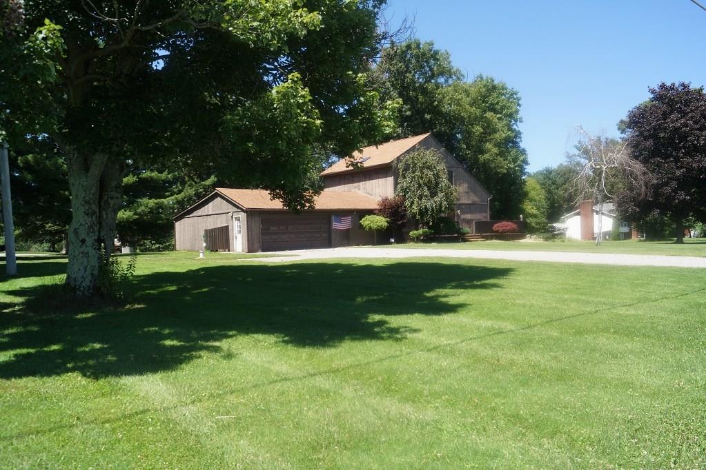 152 Reiber Road Renfrew, PA 16053 - Photo 21 of 25 Another angle of how much space this house has to offer. A lawn tractor is included with the purchase of the home.