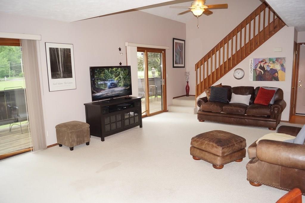 152 Reiber Road Renfrew, PA 16053 - Photo 9 of 25 The main 2 story living space leads to the side deck and offers so much natural light.
