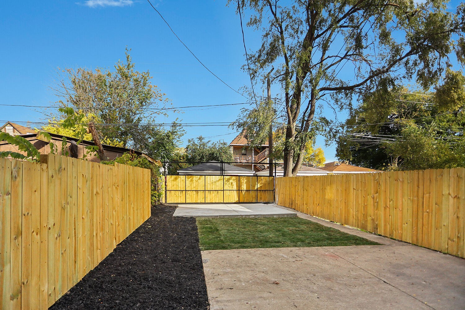 4832 West Harrison Street Chicago, IL 60644 - Photo 21 of 21 a view of swimming pool with a yard
