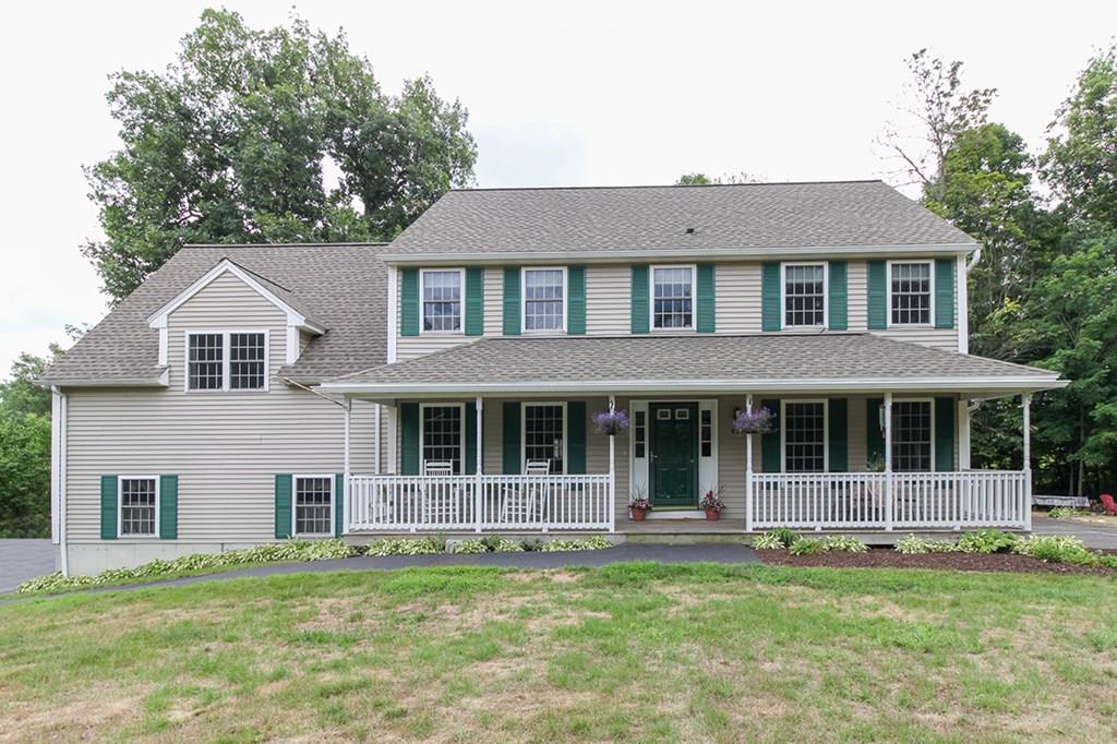 871 Northfield Road Lunenburg, MA 01462 - Photo 1 of 39 front view of a house with a yard