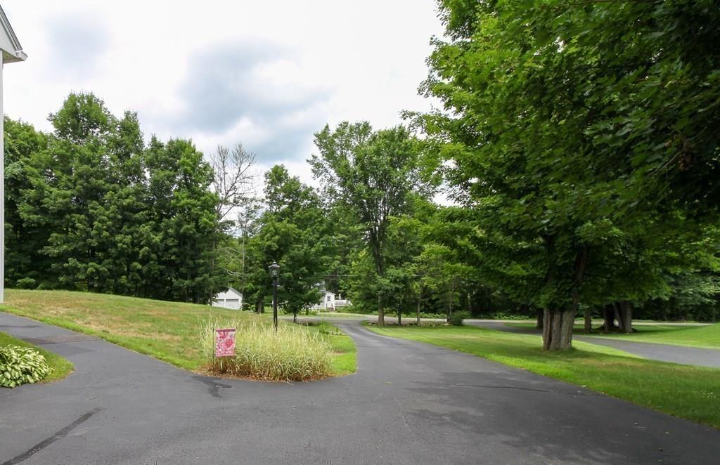 871 Northfield Road Lunenburg, MA 01462 - Photo 8 of 39 a view of a park with large trees