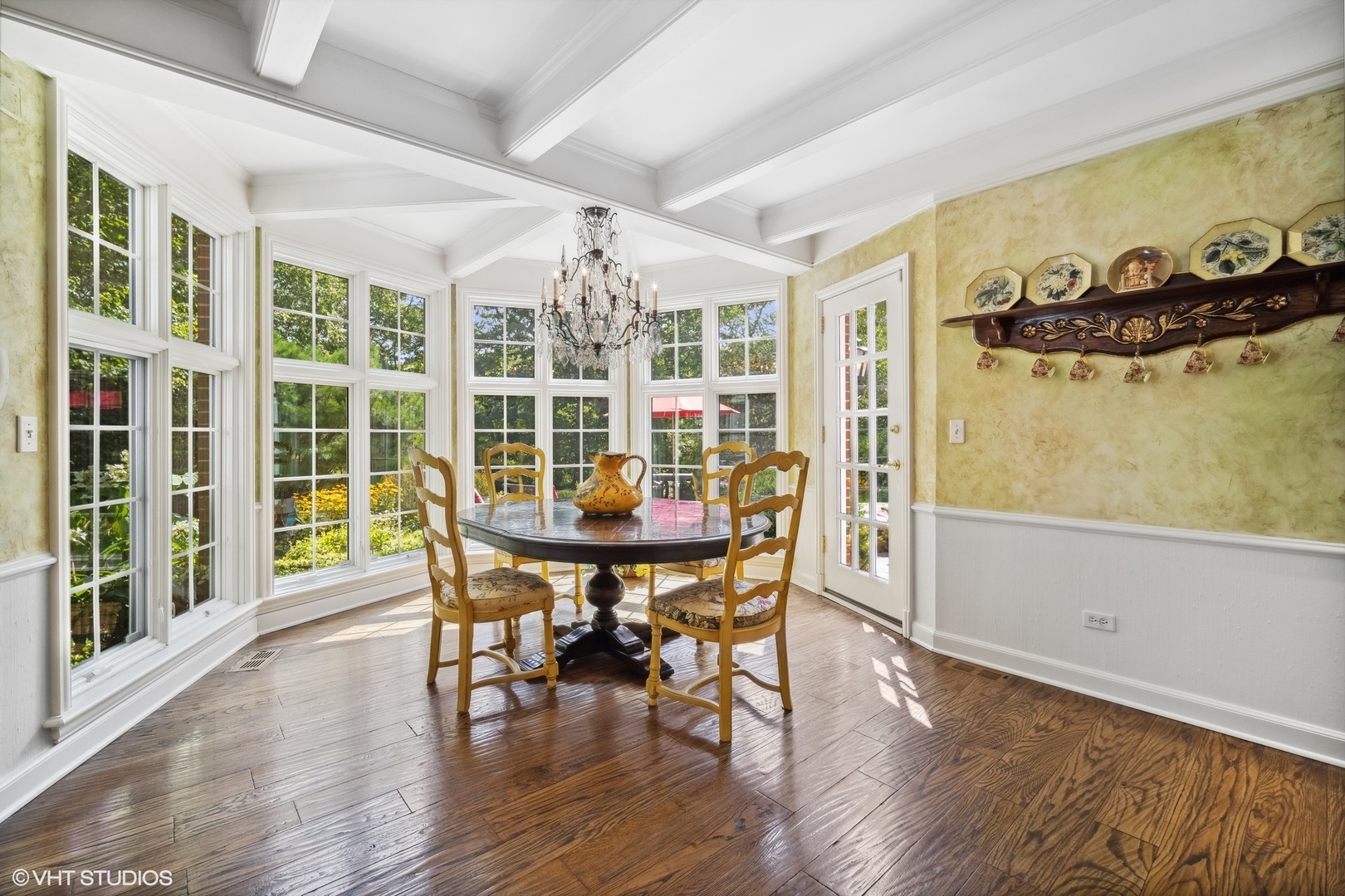 1214 Turicum Road Lake Forest, IL 60045 - Photo 12 of 37 a view of a dining room with furniture window and wooden floor