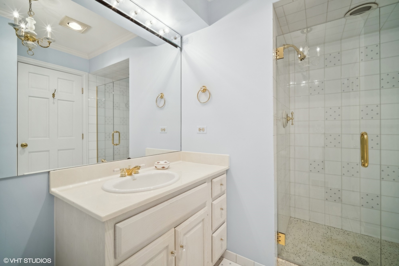 1214 Turicum Road Lake Forest, IL 60045 - Photo 22 of 37 a bathroom with a sink vanity and a shower
