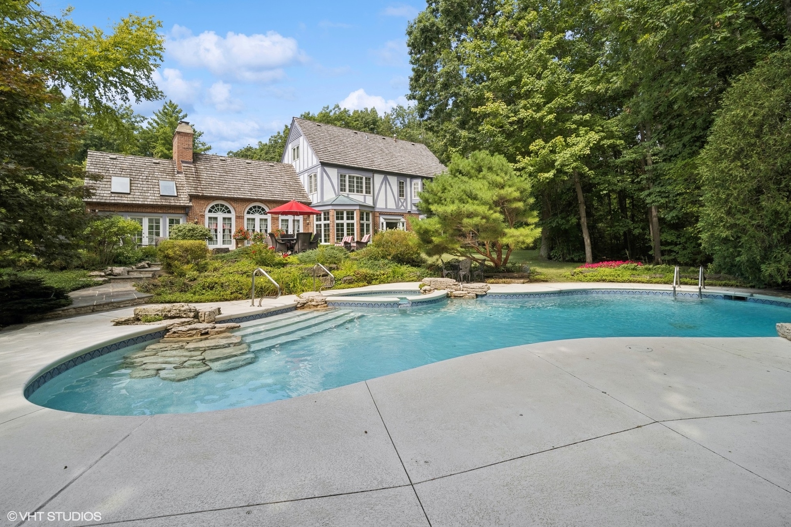 1214 Turicum Road Lake Forest, IL 60045 - Photo 31 of 37 a view of swimming pool and trees in the background