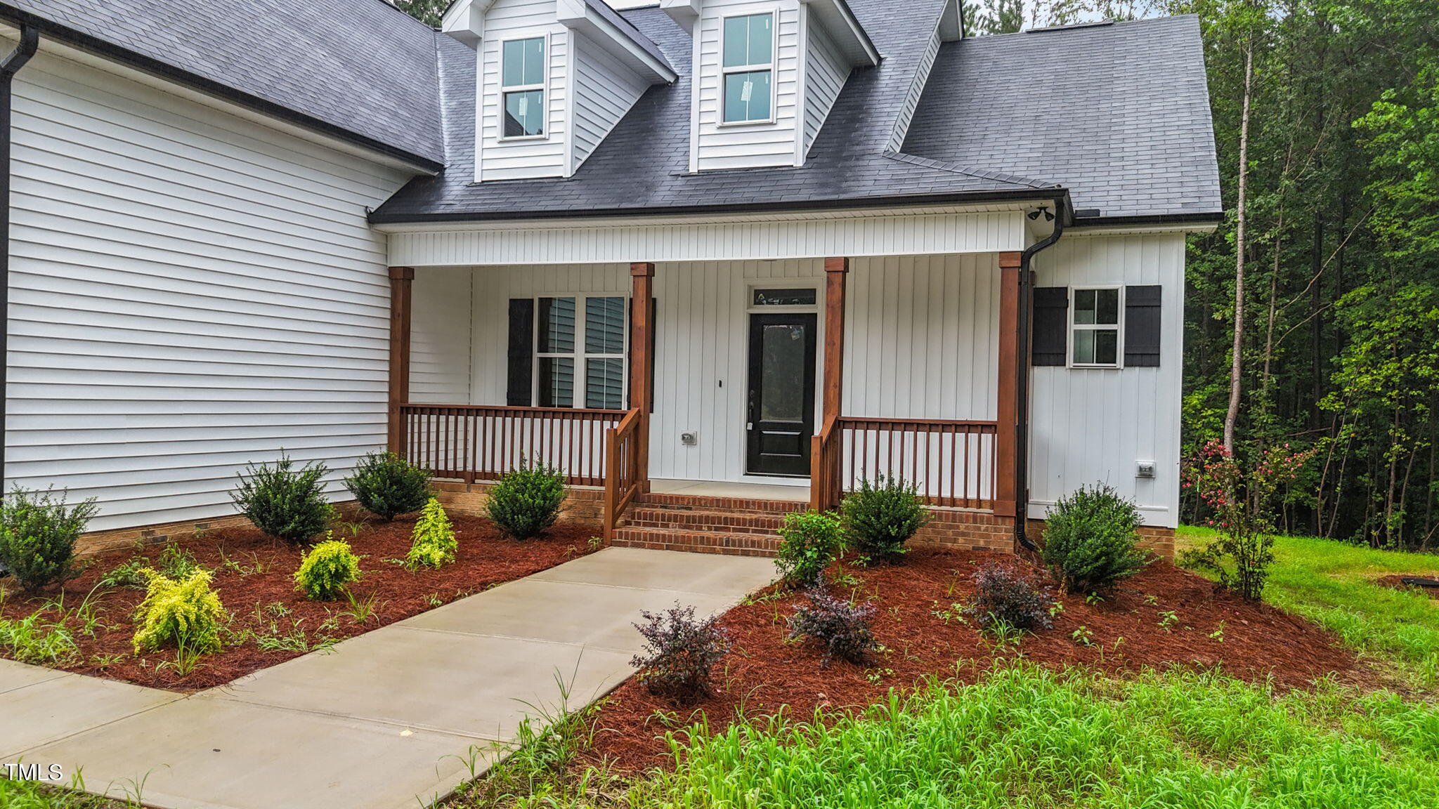 70 Copper Penny Road Zebulon, NC 27597 - Photo 3 of 33 3-web-or-mls-DJI_20250807214647_0341_D